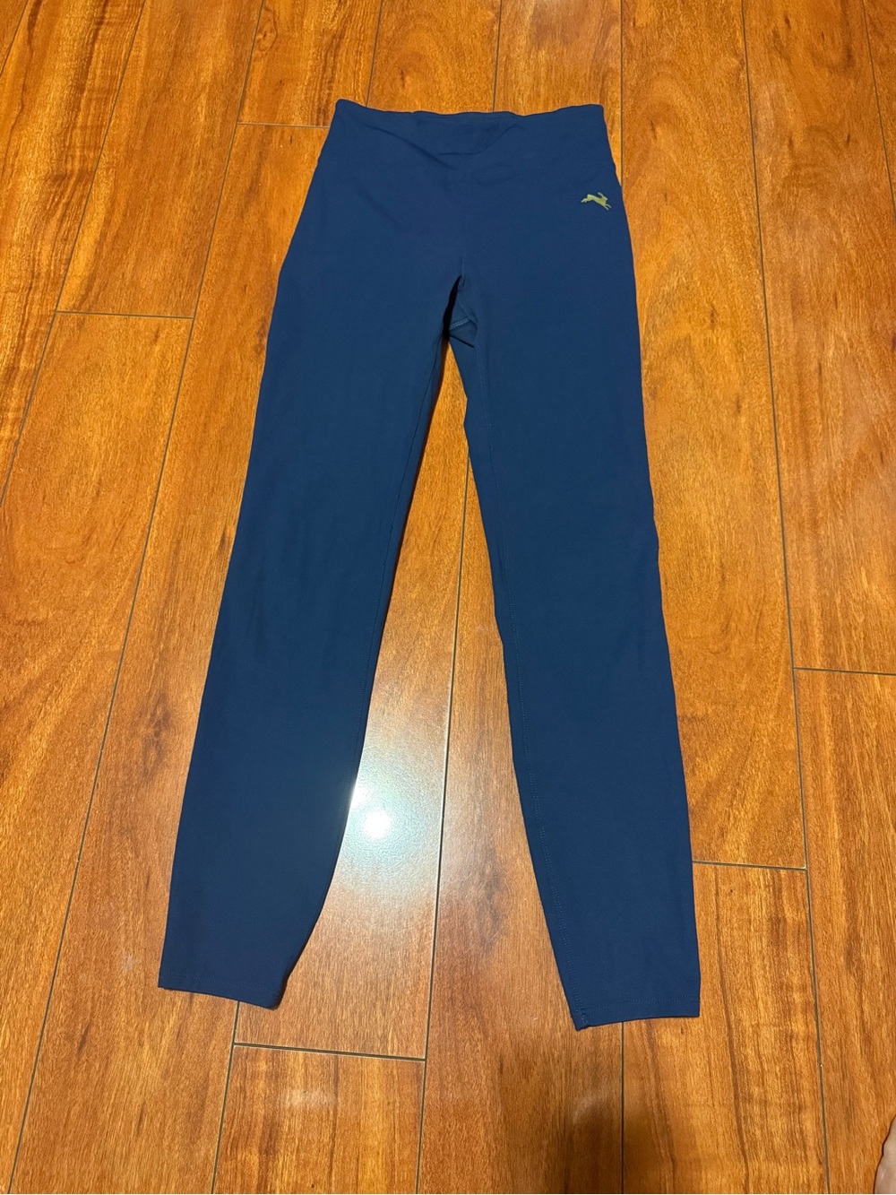 Tracksmith Women's Navy Athletic Top with Gold Logo Accent